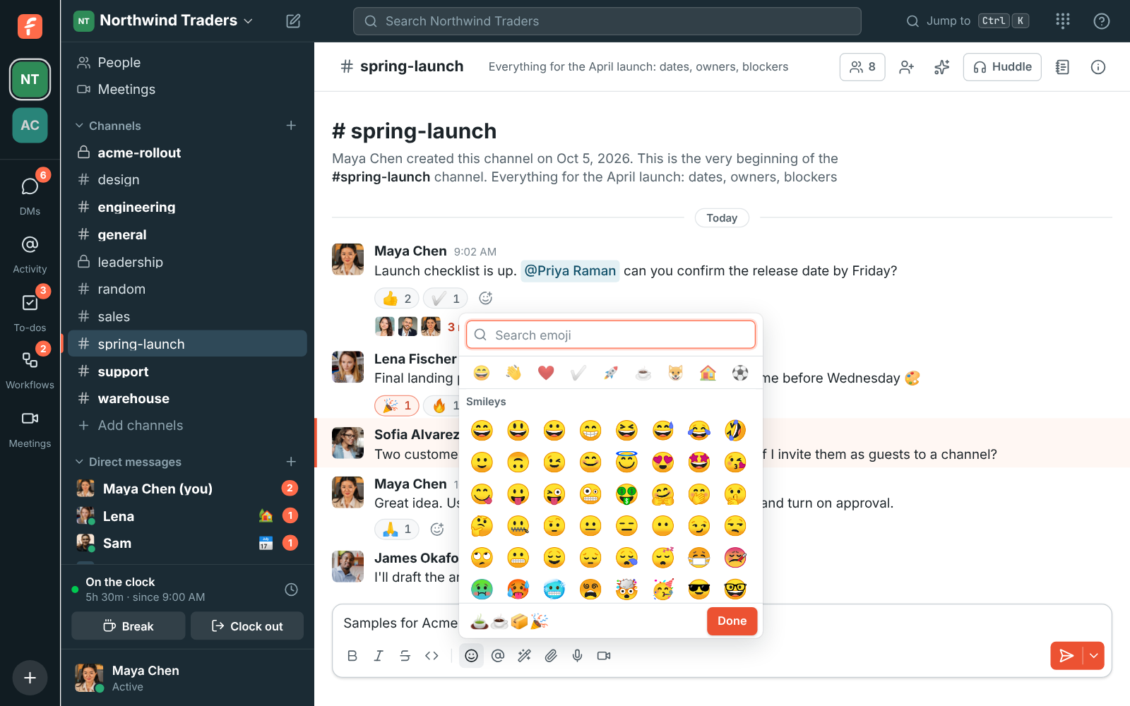 The emoji picker open over the message box in #spring-launch, with four emoji added to the message and Done at the bottom